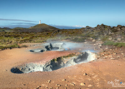 Gunnuhaver geothermal area with Reykjanesviti Lighthouse in the