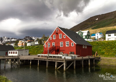 Siglufjörður tow in North Iceland. Red house by the harbour