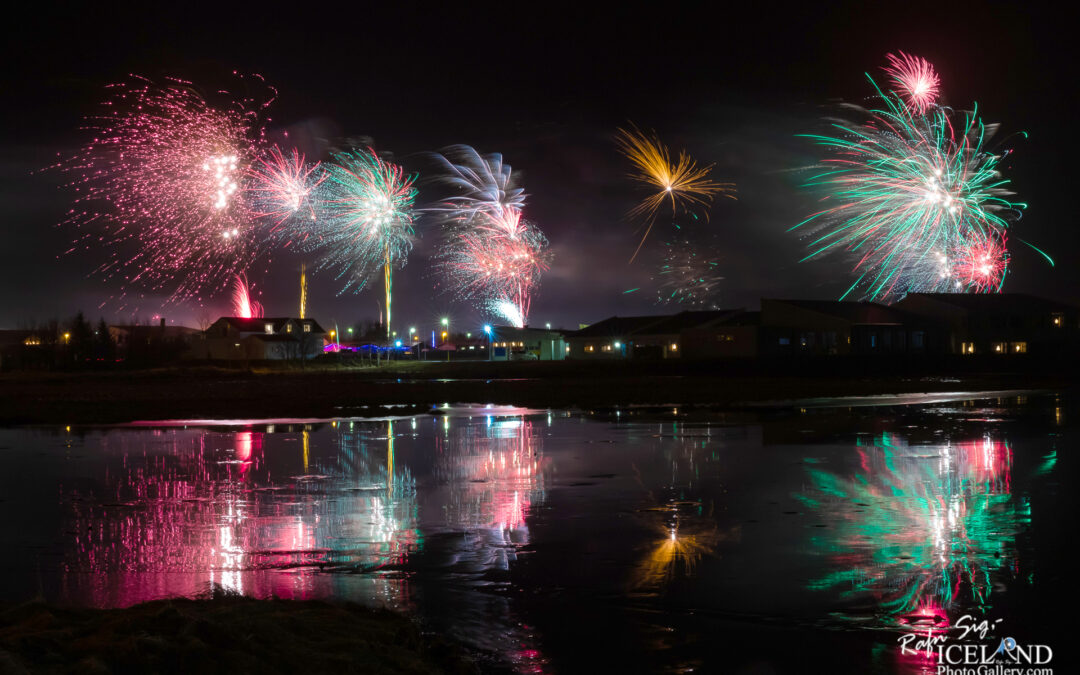 Iceland New Year’s Eve Fireworks with reflection │ Vogar, Reykjavnes