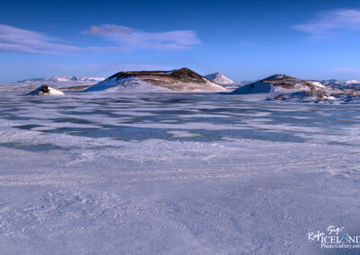 Snowy frozen Lake in Iceland, capturing the essence of winter beauty in a breathtaking landscape.