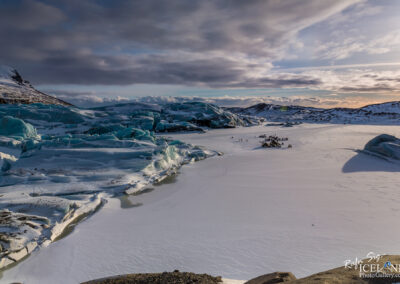 A large glacier, prominently featuring ice and snow, reflecting the serene and majestic nature of polar environments.